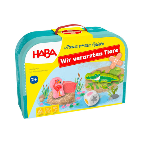 Kinder spielen Meine ersten Spiele - Wir verarzten Tiere mit Arztkoffer zur tierischen Pflege
