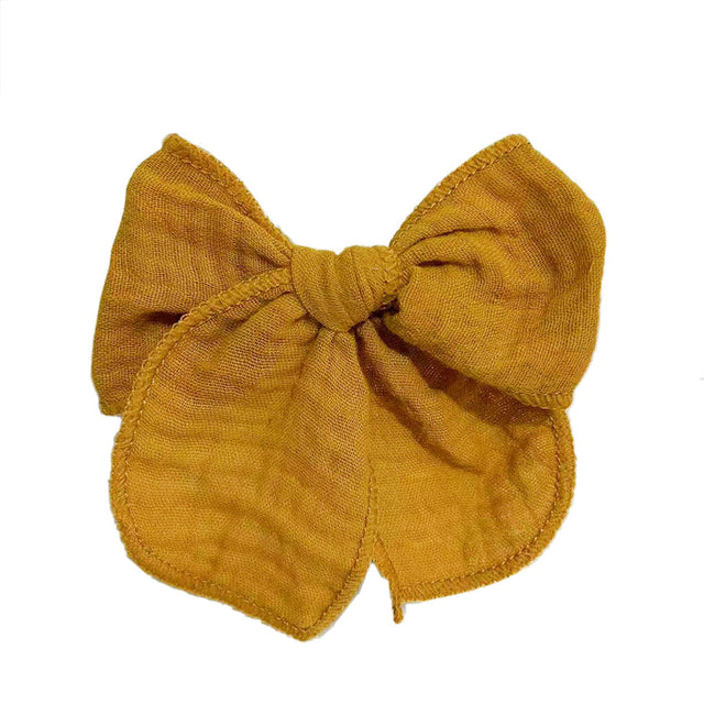 Haarspange Schleife aus Musselin für Kinder mit sonnigem Blumenmuster