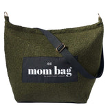 Olive Mom Bag made of teddy bouclé with spacious interior and adjustable handles for mothers