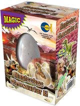 Magic Growing Egg with hatching dinosaur toy inside chocolate shell in glass of water